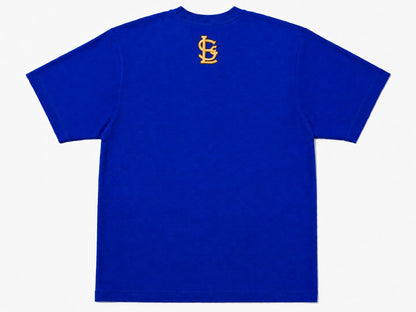 LaStarClothing™ royal blue cotton t-shirt with a gold embroidered monogram logo on the upper back